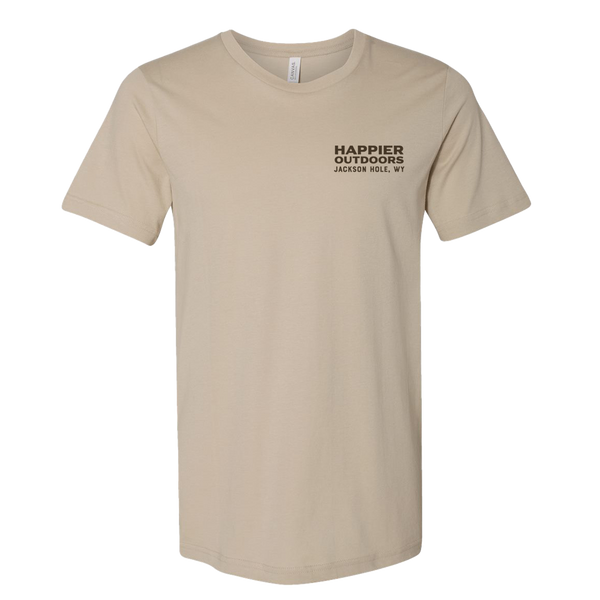 Moterra Campervans buffalo graphic tee in sand, front view. The design includes a small 'Happier Outdoors, Jackson Hole, WY' logo on the left chest