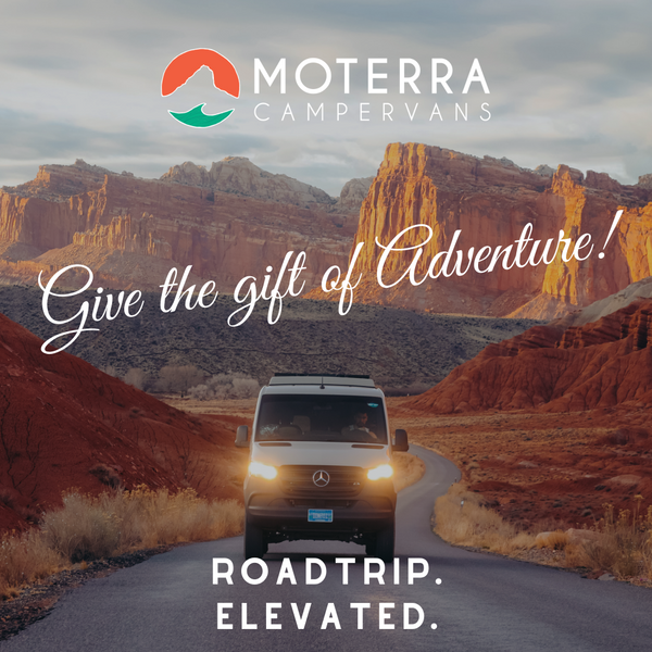 A Moterra Trip Gift Card Moterra Campervans Sprinter Van traveling towards a National Park, with the words "Give the gift of Adventure!" and "ROADTRIP. ELEVATED." promoting .